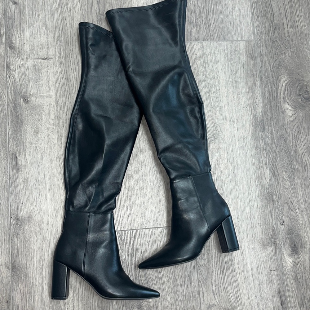 black thigh high leather boot